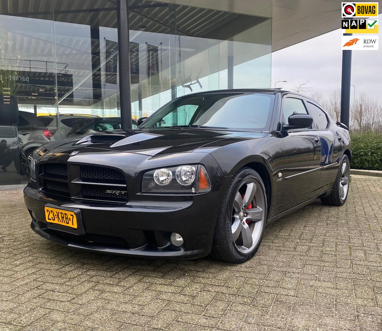 Dodge Charger - SRT-8 6.1L HEMI SCHUIFDAK/CRUISE/STOELVERWARMING 433 PK - AutoWereld.nl