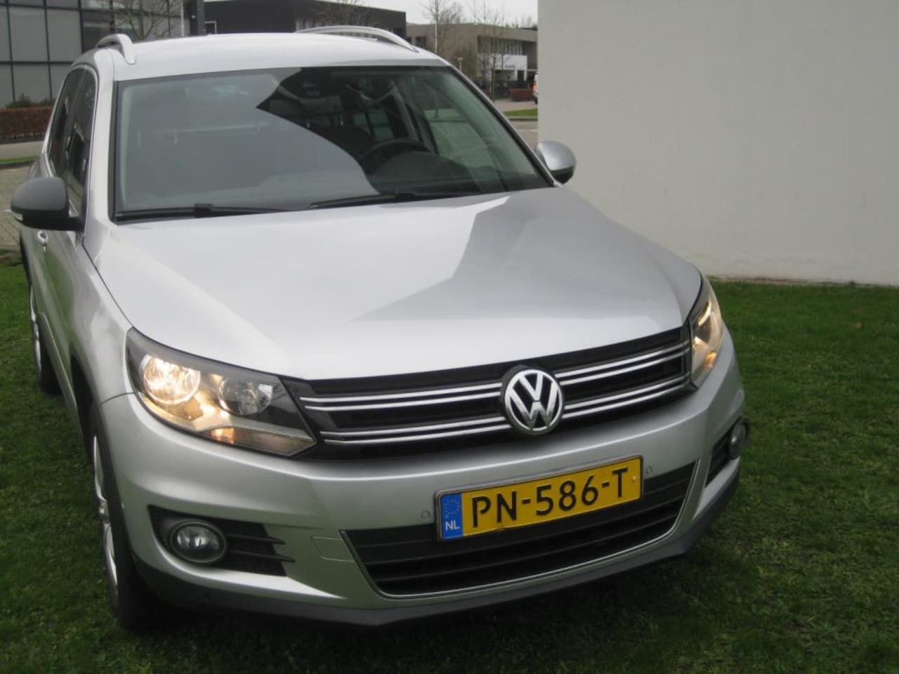 Volkswagen Tiguan - 2.0 TSI Sport&Style 4Motion AUT LEDER NAVI 4x4 - AutoWereld.nl