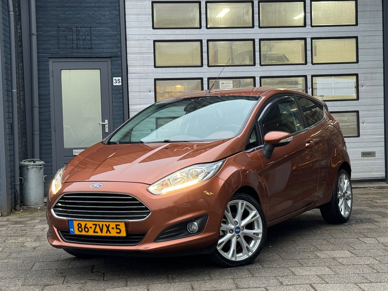 Ford Fiesta - 1.0 EcoBoost Titanium | Clima | Cruise | PDC | LMV | N.A.P - AutoWereld.nl