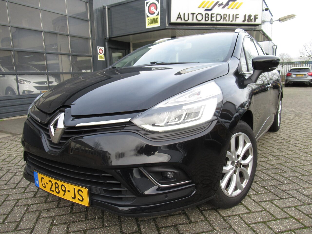 Renault Clio Estate - 0.9 TCe Intens / 1ste Eigenaar / NAV / PDC V+A / Trekhaak / Half Leder - AutoWereld.nl