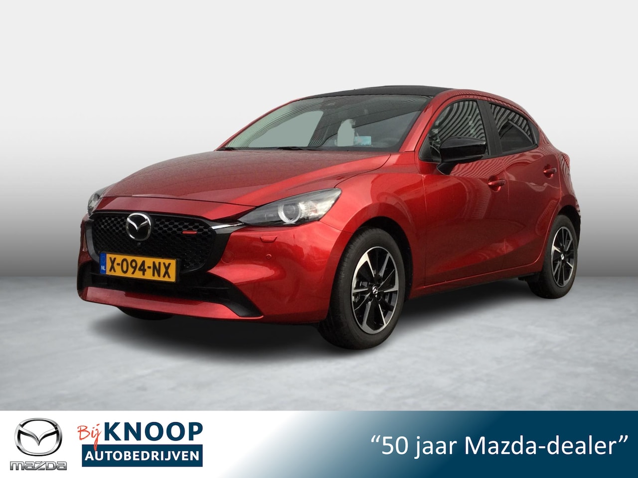 Mazda 2 - 1.5 e-SkyActiv-G 90 Homura Aka + Driver Assistance Pack - AutoWereld.nl