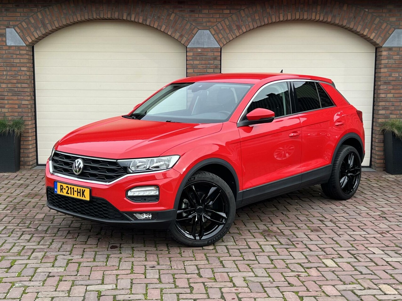 Volkswagen T-Roc - 1.5 TSI DSG Clima PDC v+a Lane assist 21.566 KM! - AutoWereld.nl