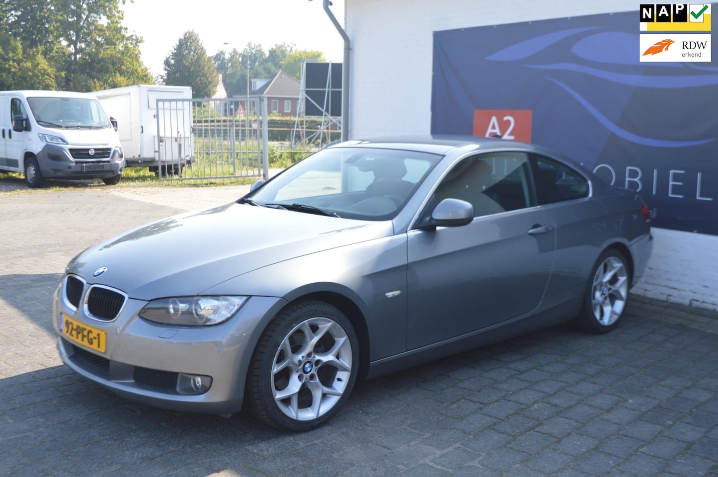 BMW 3-serie Coupé - 320i Executive / AIRCO / CRUISE CONTROL / NAVIGATIE - AutoWereld.nl