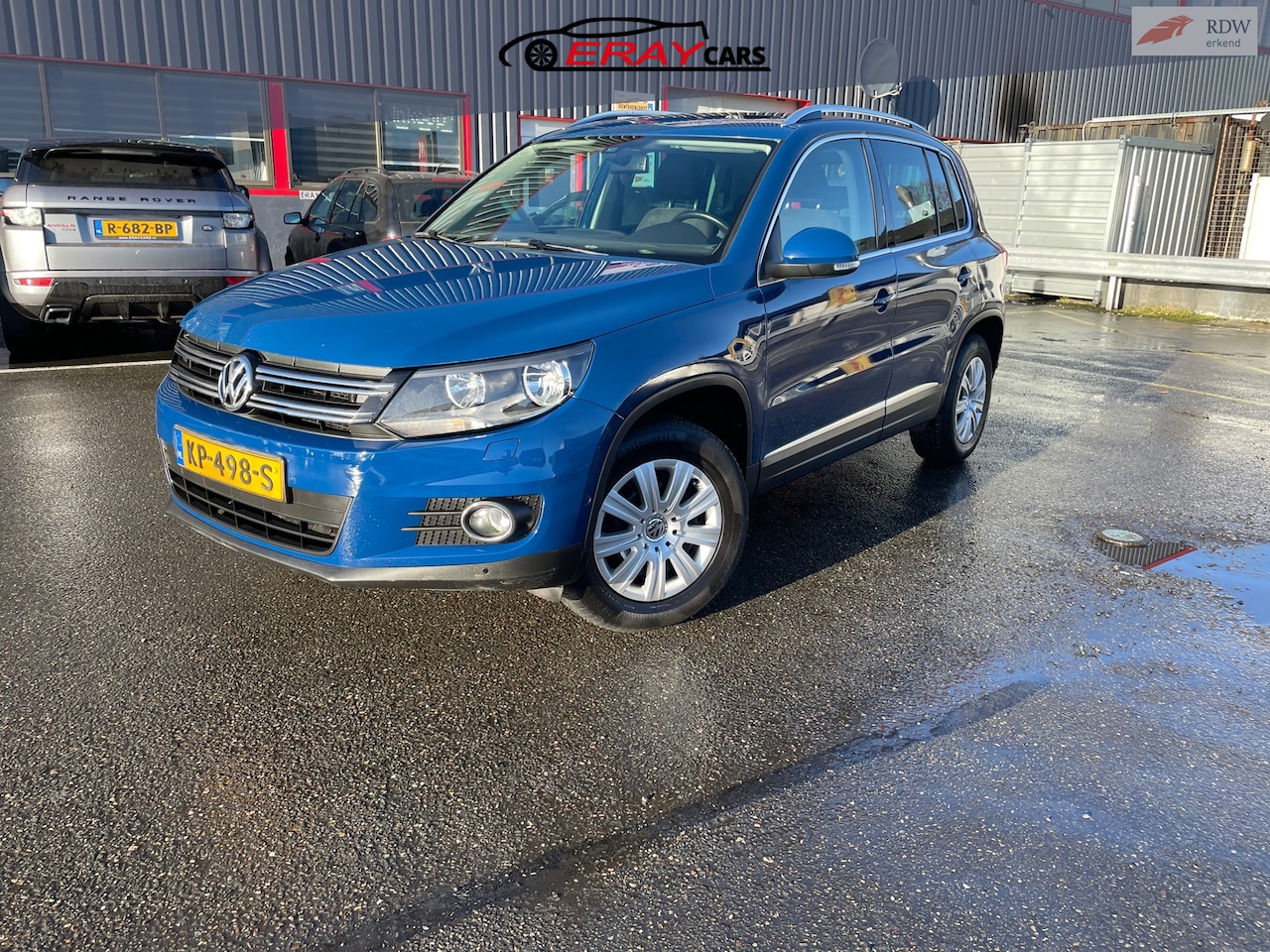 Volkswagen Tiguan - 1.4 TSI Sport&Style R-line Edition / PANO / CAMERA / NAVI / - AutoWereld.nl