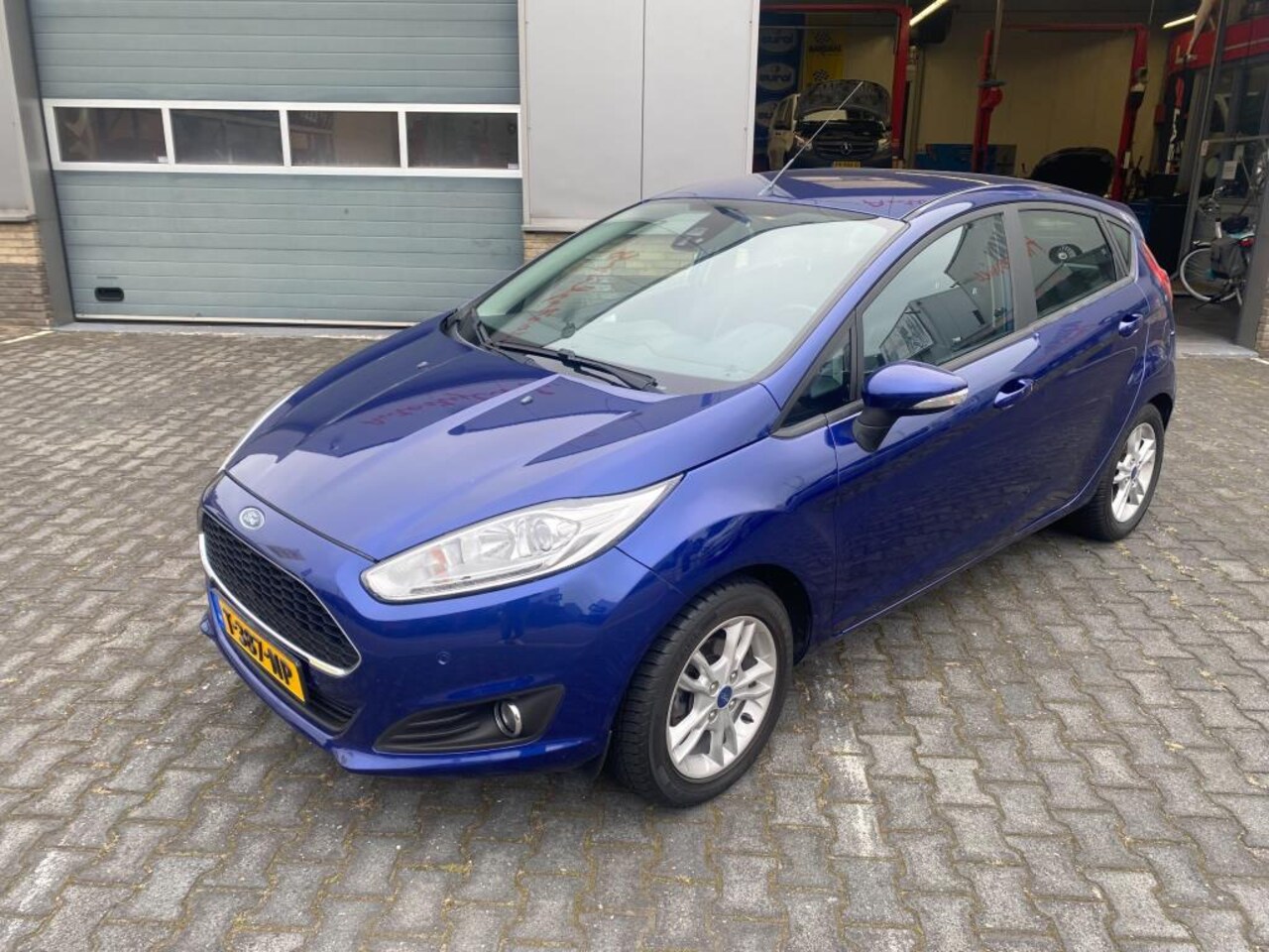 Ford Fiesta - 1.0 Style Ultimate | AIRCO | PDC V+A | LMV | BLUETOOTH | - AutoWereld.nl