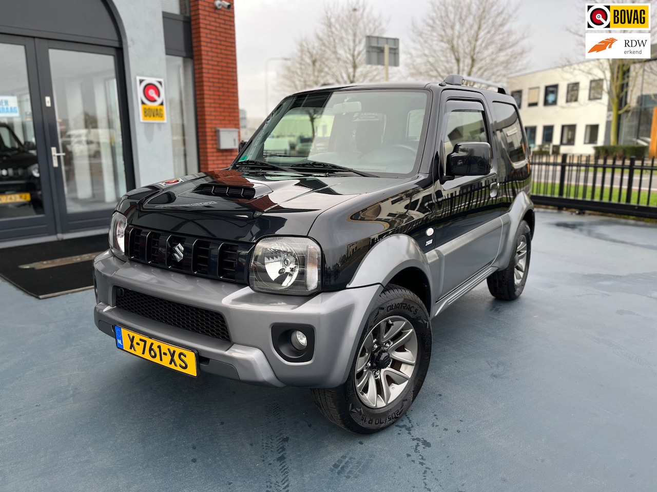 Suzuki Jimny - 1.3 Exclusive 4X4 AUTOMAAT LEER - AutoWereld.nl