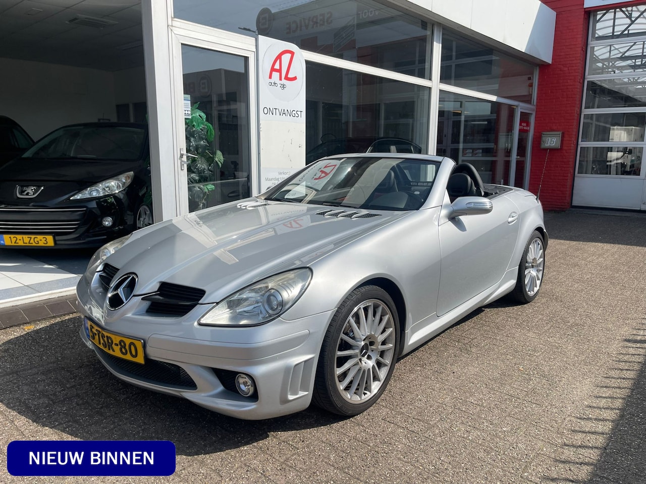 Mercedes-Benz SLK-klasse - 55 AMG - 1e eigenaar / Cruise control / Lederen bekleding / Airco / AMG-styling / Audio in - AutoWereld.nl