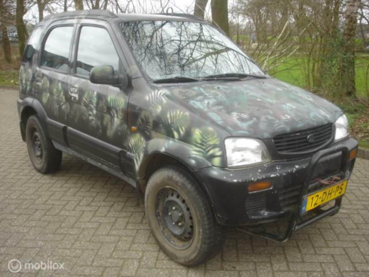 Daihatsu Terios - 1.3 SX 4X4 4WD Airco Koppakking lek - AutoWereld.nl