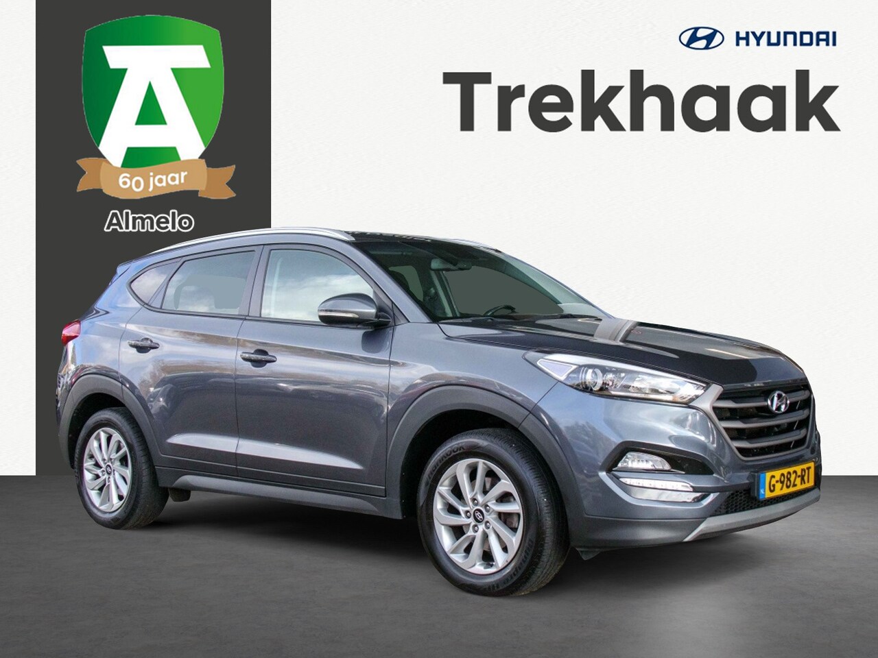 Hyundai Tucson - 1.6 GDi Anniversary Edition | Trekhaak | Navigatie | Stoelverwar - AutoWereld.nl