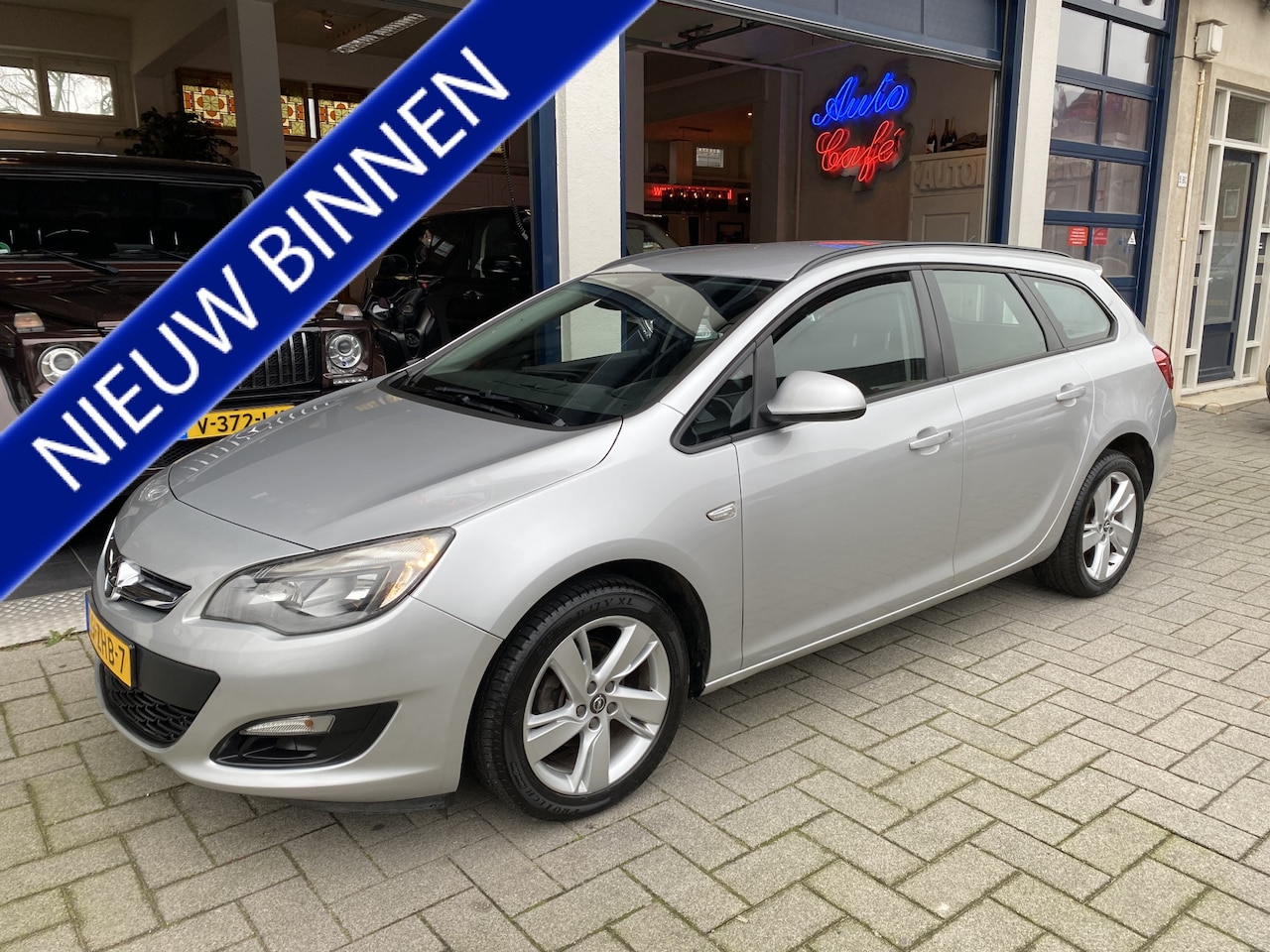 Opel Astra Sports Tourer - 1.4 Cosmo NAVI/CLIMA/CRUISE - AutoWereld.nl