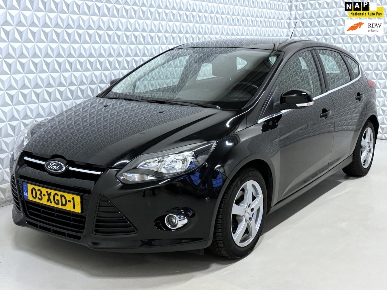 Ford Focus - 1.0 EcoBoost Titanium - LEES ADVERTENTIE (2012) - AutoWereld.nl