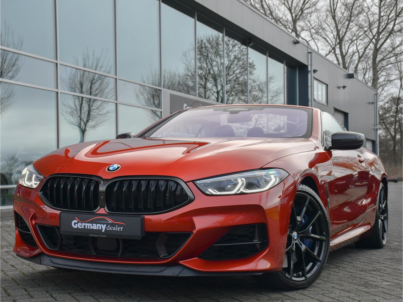 BMW 8-serie - M850i 531pk xDrive High Executive Sunset Orange 4W Sturing Carbon Core - AutoWereld.nl