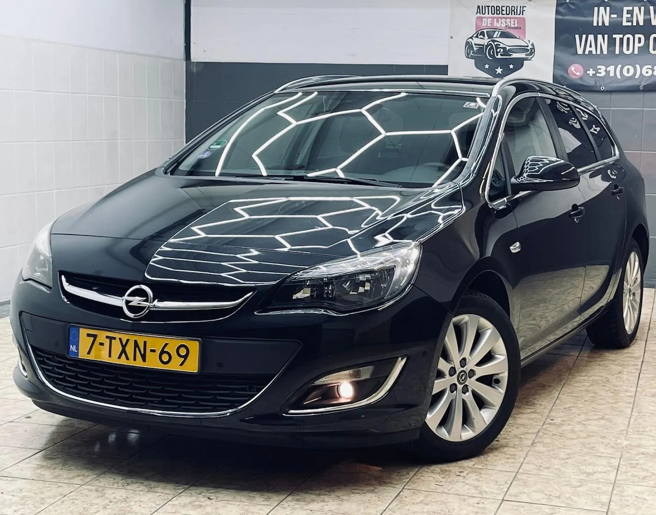 Opel Astra Sports Tourer - 1.4 Turbo Cosmo 1.4 Turbo Cosmo - AutoWereld.nl