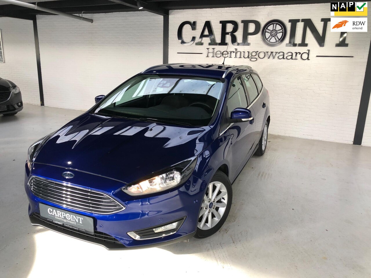 Ford Focus Wagon - 1.5 Titanium 150PK 2016 Automaat Camera Navi Dode hoek Lane Assist Cruise Clima Dealer OH - AutoWereld.nl