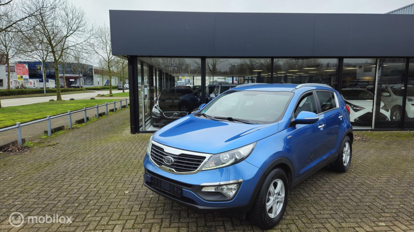 Kia Sportage - 2.0 X-ecutive 4wd 2.0 X-ecutive 4wd - AutoWereld.nl