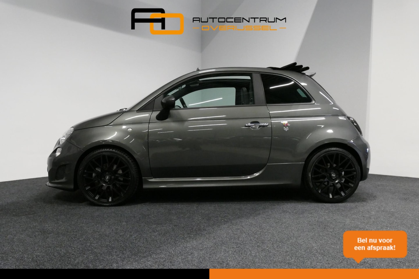 Fiat 500 C - 1.4 T-Jet Abarth 595 Turismo / Xenon / 17" Momo LMV / Clima / PDC / Leder / Navigatie - AutoWereld.nl