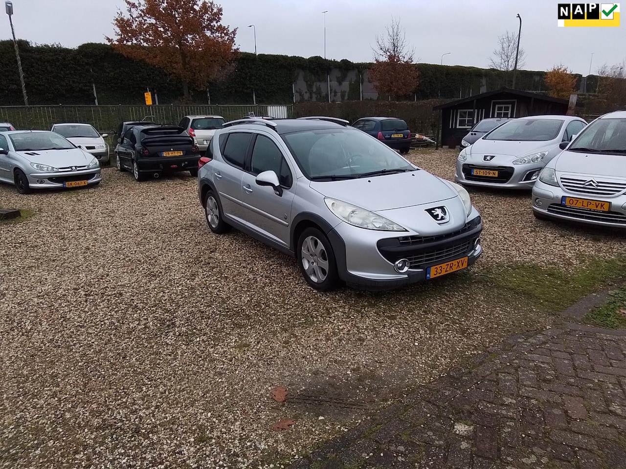 Peugeot 207 SW Outdoor - 1.6 VTi XS zeer lux,s airco trekhaak paneramadak radio cd - AutoWereld.nl