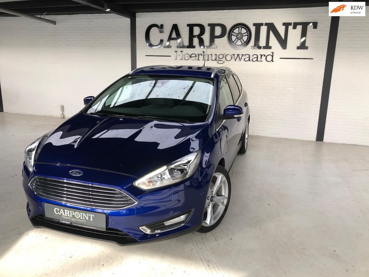 Ford Focus Wagon - 1.5 Titanium Edition 2014 150PK Camera Leer Navi Parkpilot Cruise Clima - AutoWereld.nl