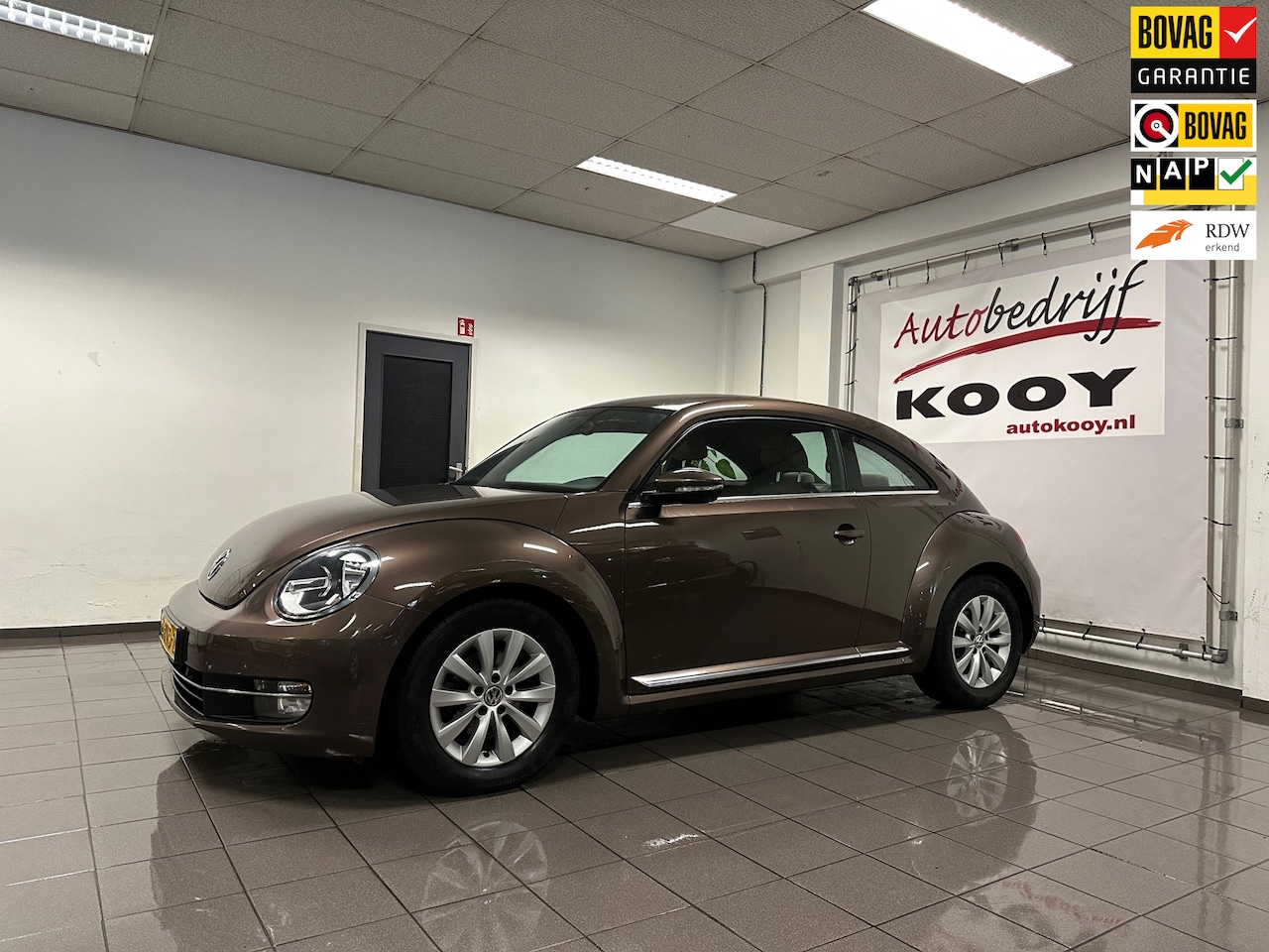 Volkswagen Beetle - 1.2 TSI Design * 1e Eig / Leder / Navigatie / Cruise control / LM Velgen * - AutoWereld.nl