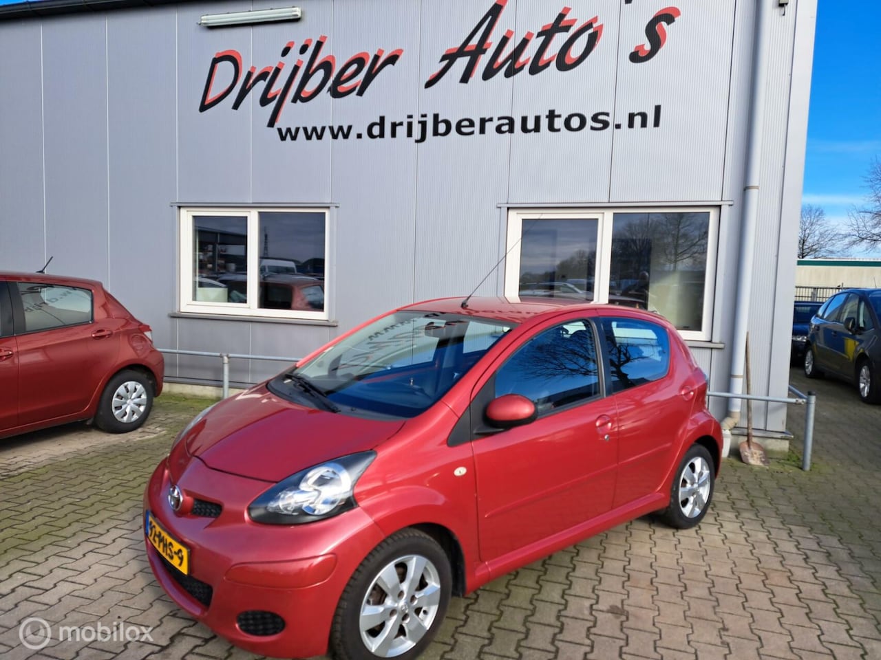 Toyota Aygo - 1.0-12V Aspiration Red Navigator 1.0-12V Aspiration Red Navigator - AutoWereld.nl