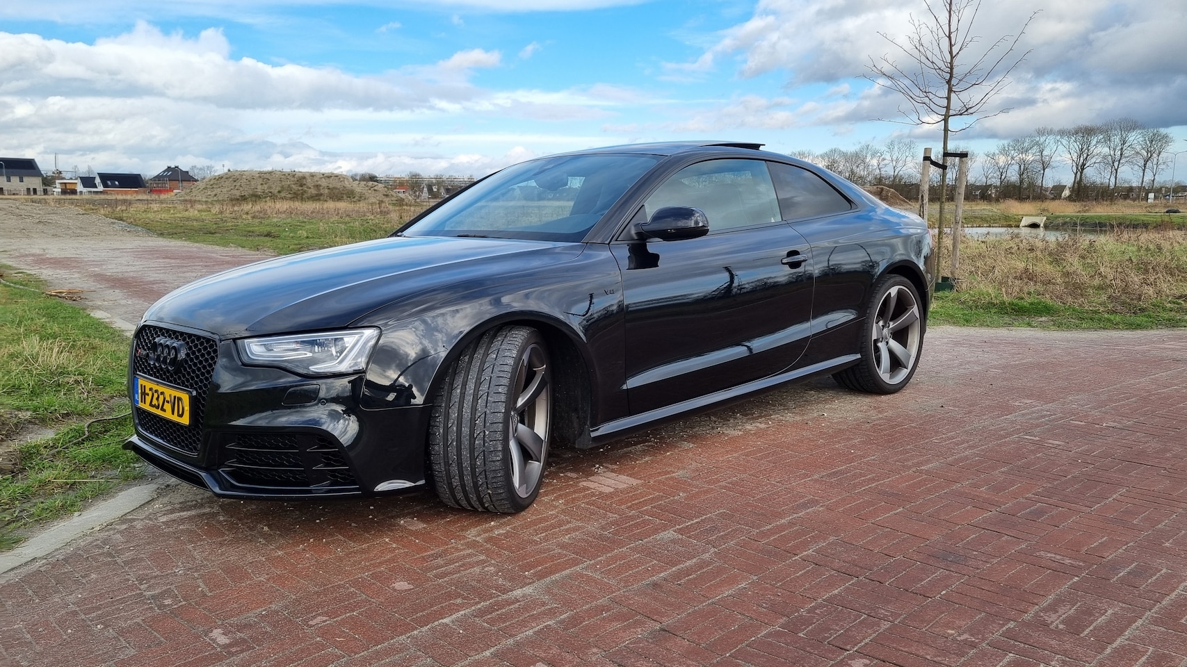 Audi A5 Coupé - 4.2 FSI RS5 quattro Black edition - AutoWereld.nl