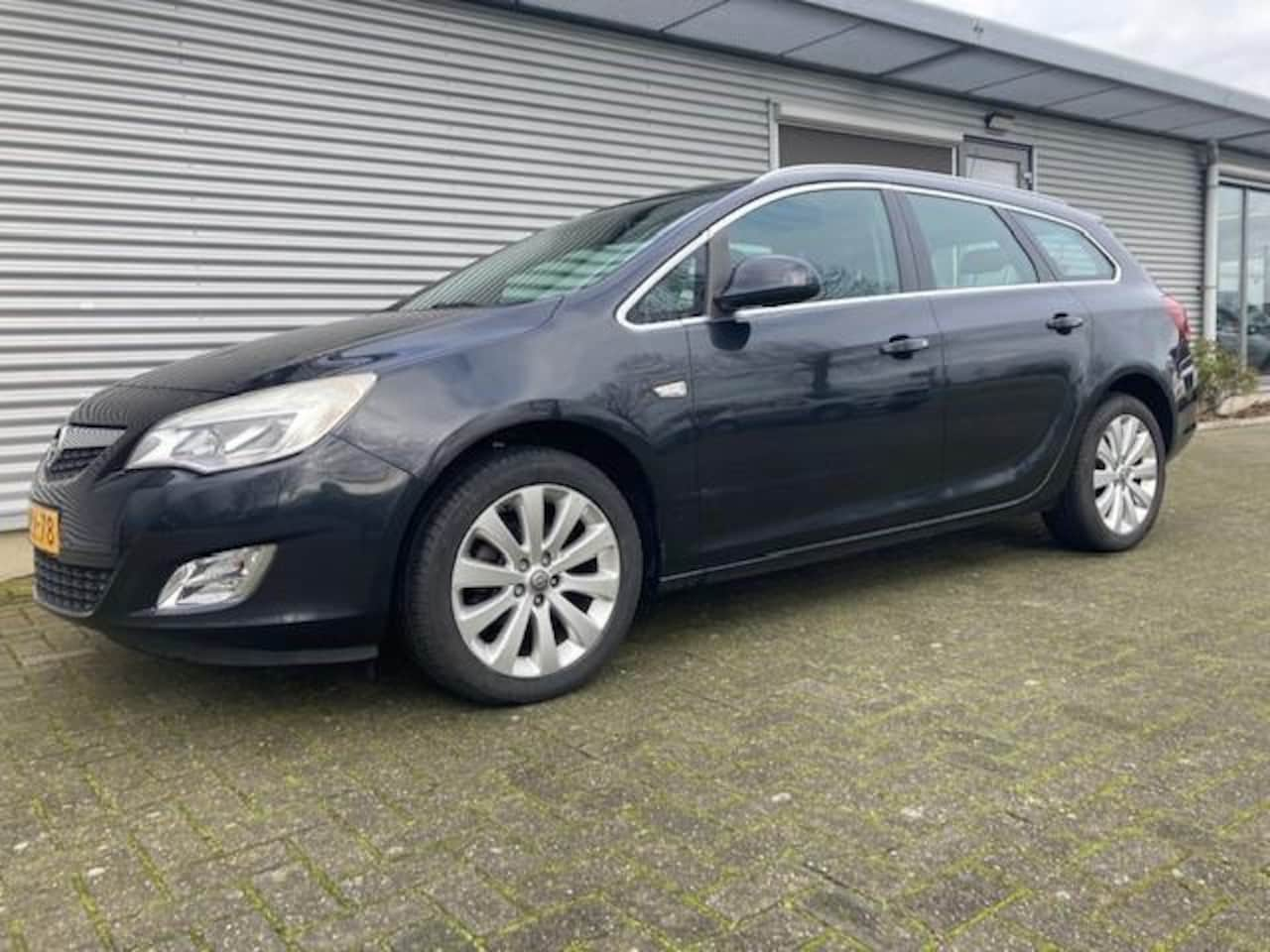 Opel Astra Sports Tourer - 1.4 Turbo Sport 1.4 Turbo Sport - AutoWereld.nl