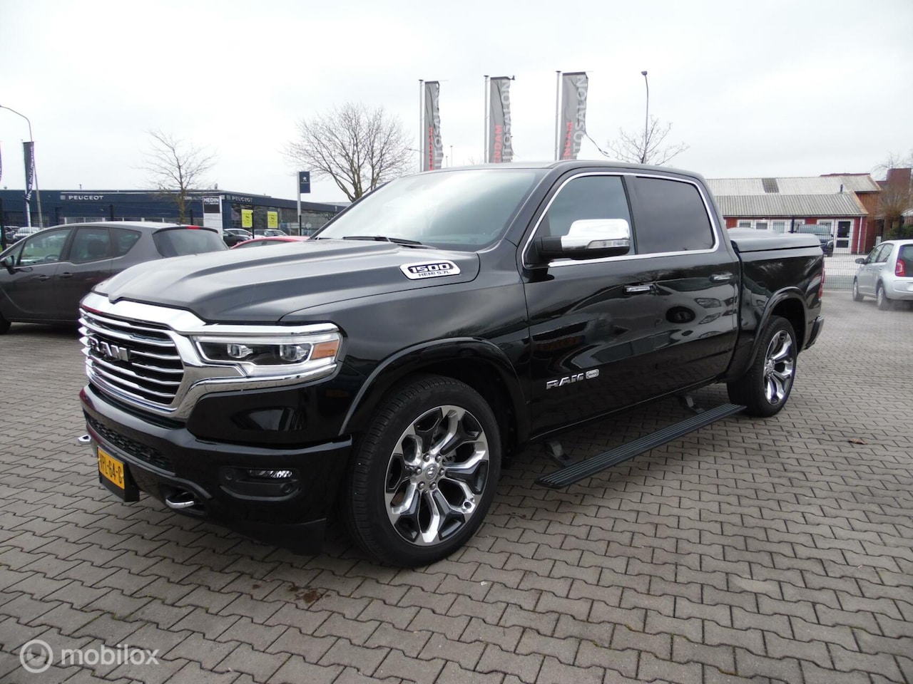 Dodge Ram 1500 - 4X4 5.7 V8 4x4 Crew Cab Long Horn Full Options - AutoWereld.nl