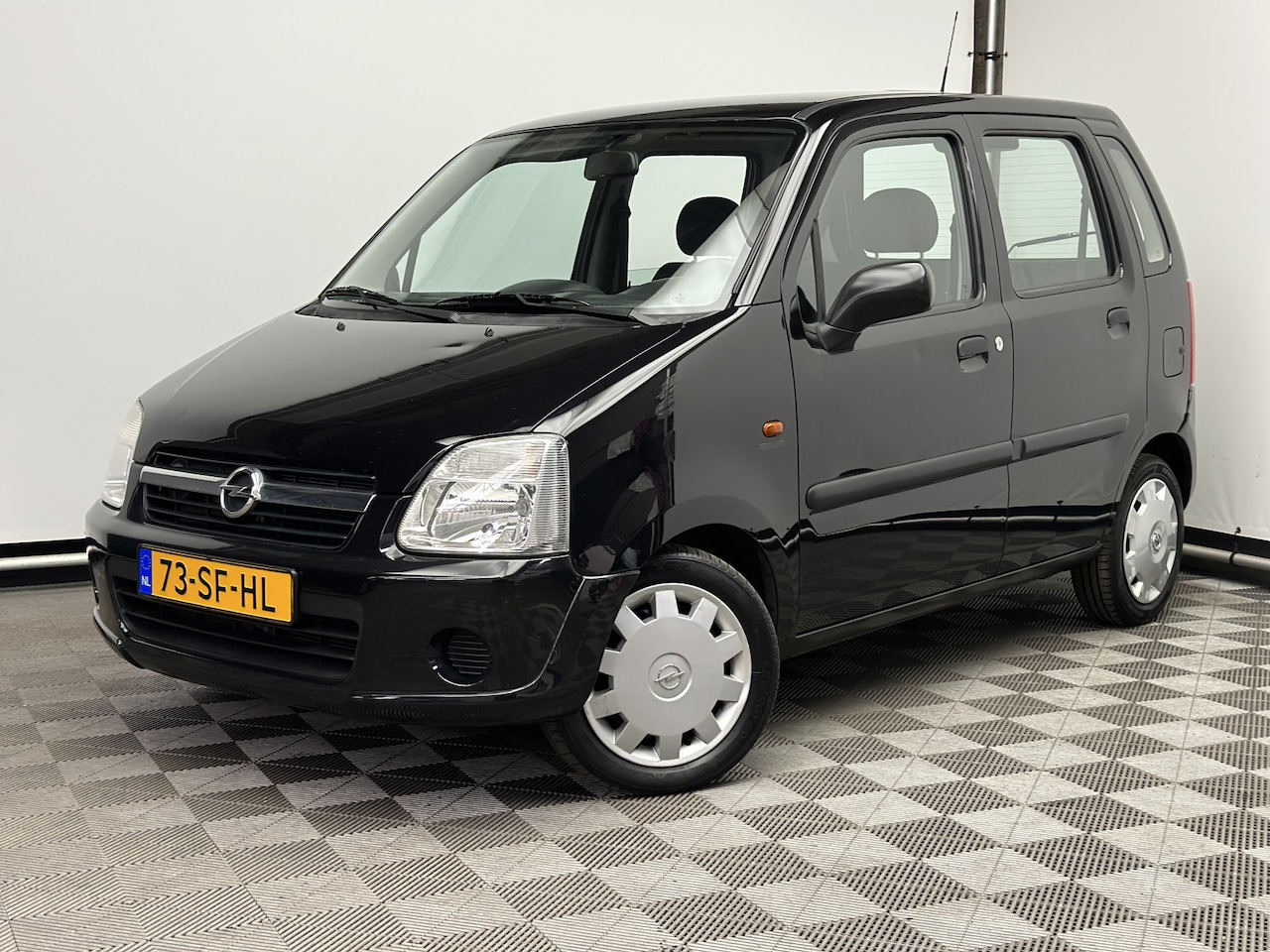 Opel Agila - 1.2-16V Flexx Airco Elek. Pakket NL Auto - AutoWereld.nl