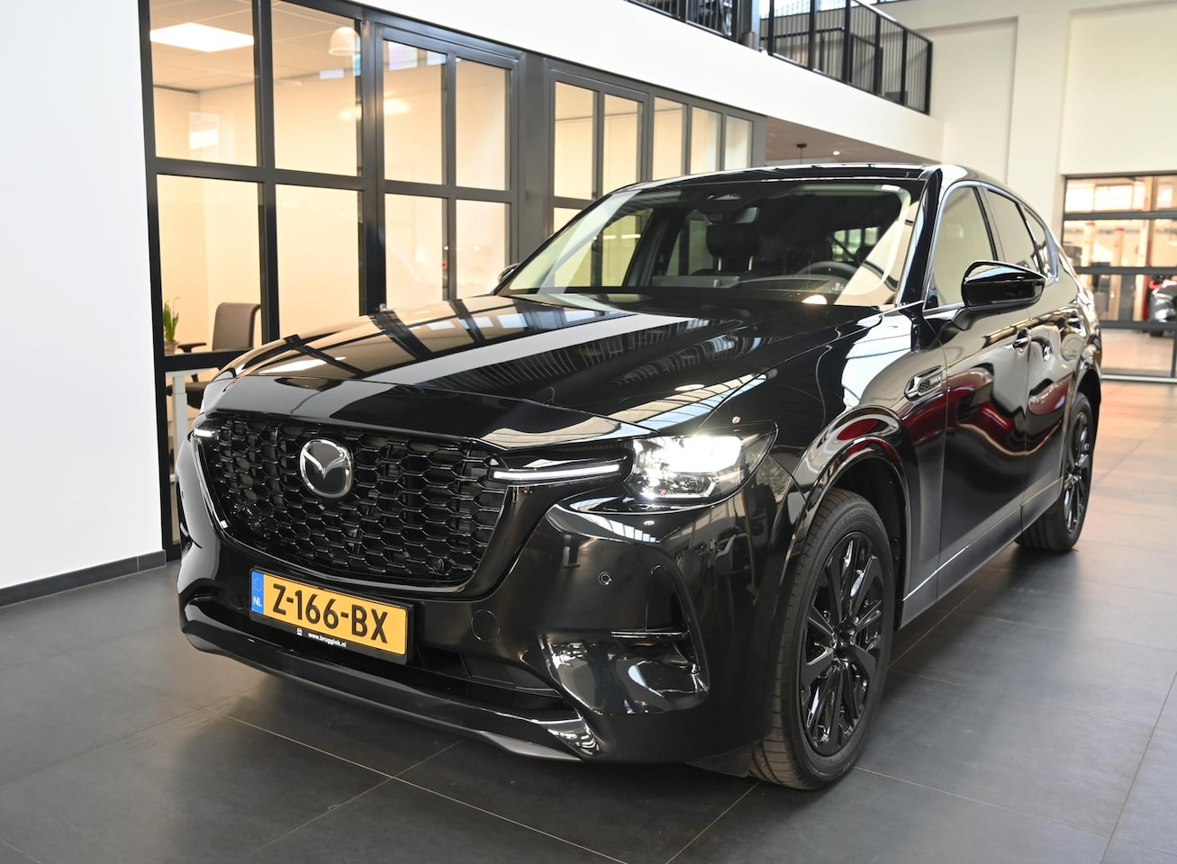 Mazda CX-60 - e-SkyActiv 327 PHEV automaat Homura met Driver Assistance Pack *Demo* - AutoWereld.nl