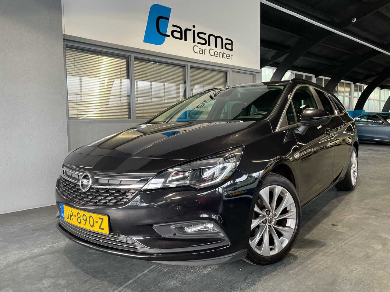 Opel Astra Sports Tourer - 1.4 Turbo 150 PK Business+ Schuifdak|Navi|Cruise - AutoWereld.nl