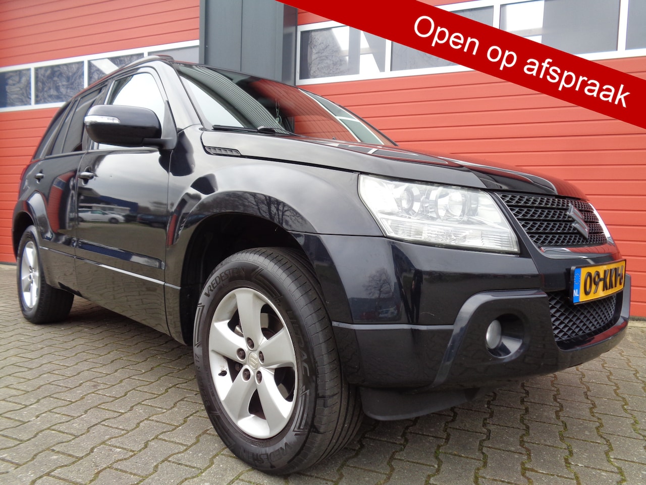 Suzuki Grand Vitara - 2.4 Exclusive 168PK Clima Cruise Navi Trekhaak LMV NL-Auto - AutoWereld.nl