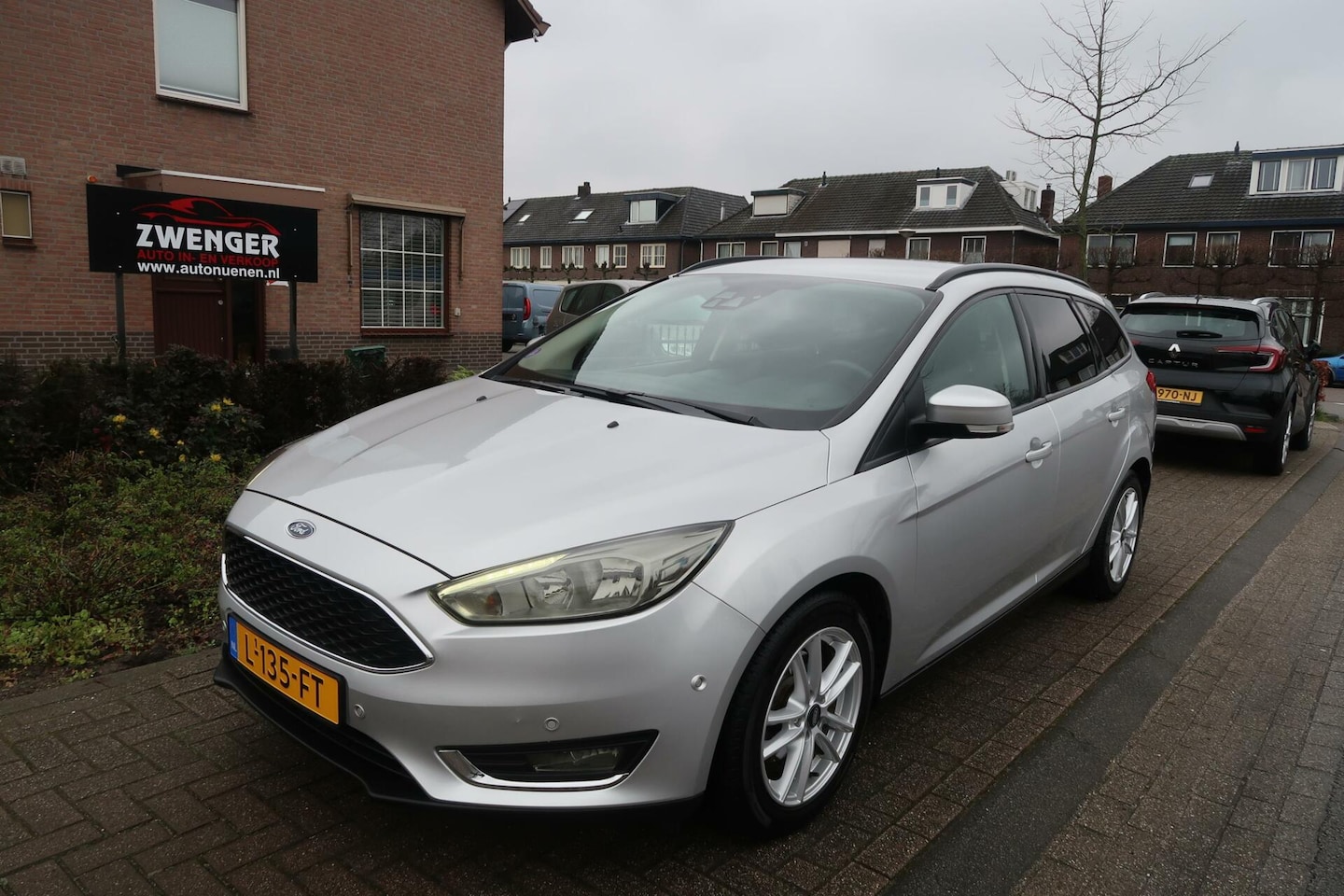 Ford Focus Wagon - 1.0 NIEUWMODEL|NAVIGATIE|STUURVERWARMING|DODEHOEK|TREKHAAK|BLUETOOTH|PDC - AutoWereld.nl