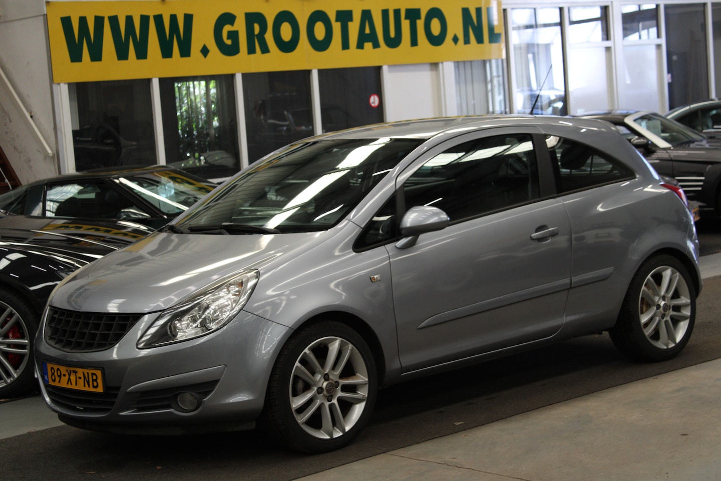 Opel Corsa - 1.4-16V Sport Airco, Cruise control, Isofix, Stuurbekrachtiging - AutoWereld.nl