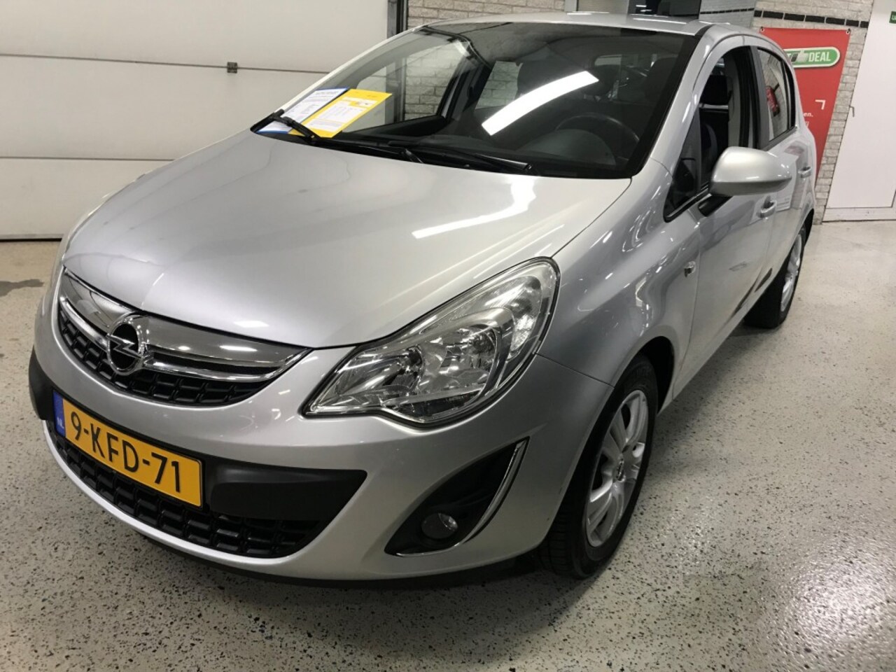 Opel Corsa - 1.2  LPG G3 OND.BOUW / AIRCO / CRUISE / NAVI / MULTIMEDIA - AutoWereld.nl