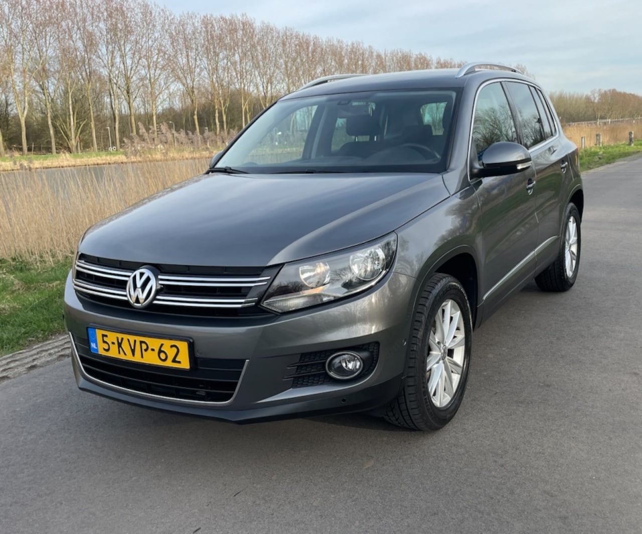 Volkswagen Tiguan - 1.4 TSI Sport&Style | 1e EIGENAAR | WEINIG KMS | NAP - AutoWereld.nl