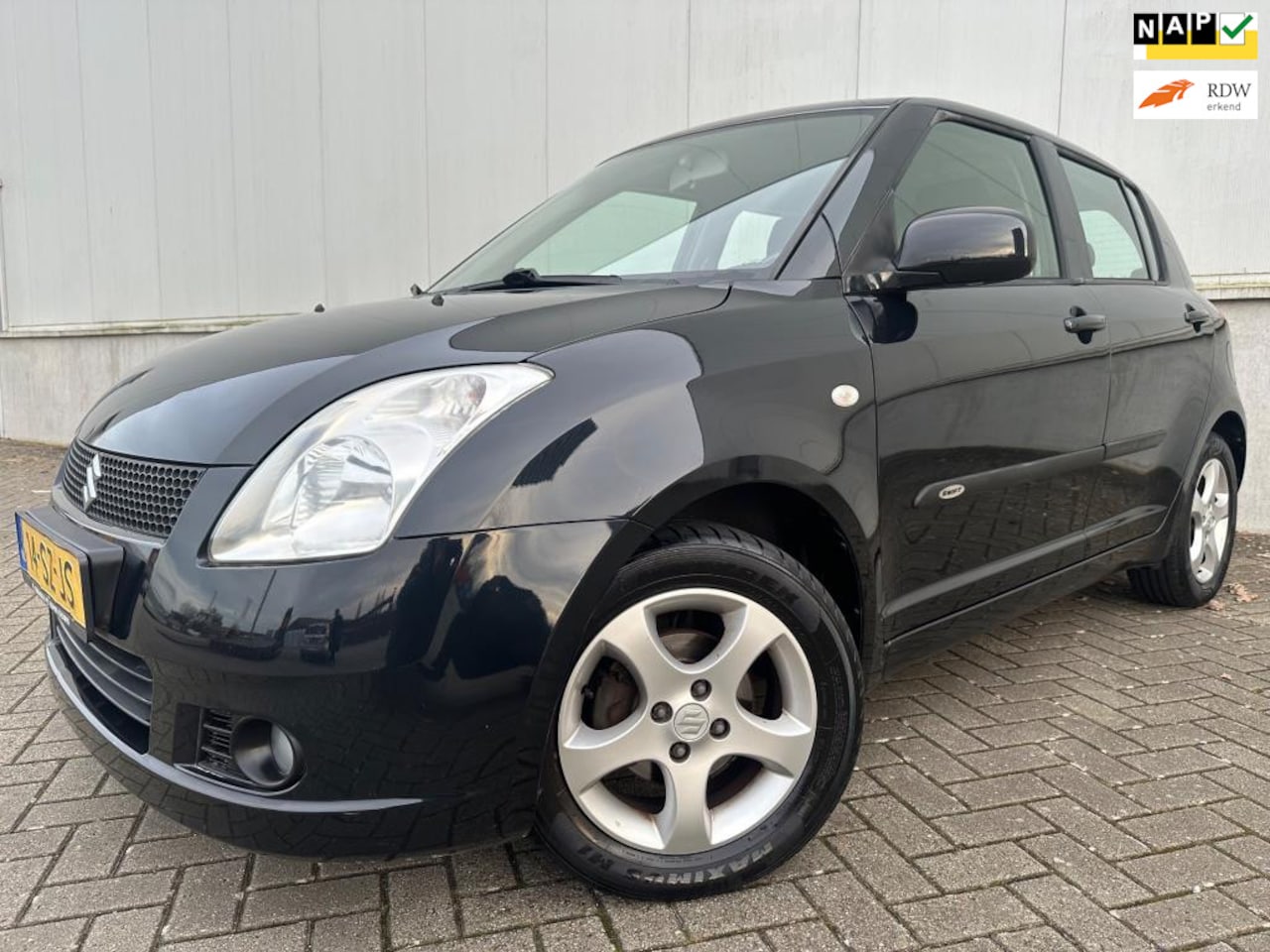 Suzuki Swift - 1.3 4Grip Exclusive UNIEK 4x4 5D Airco NL auto... - AutoWereld.nl