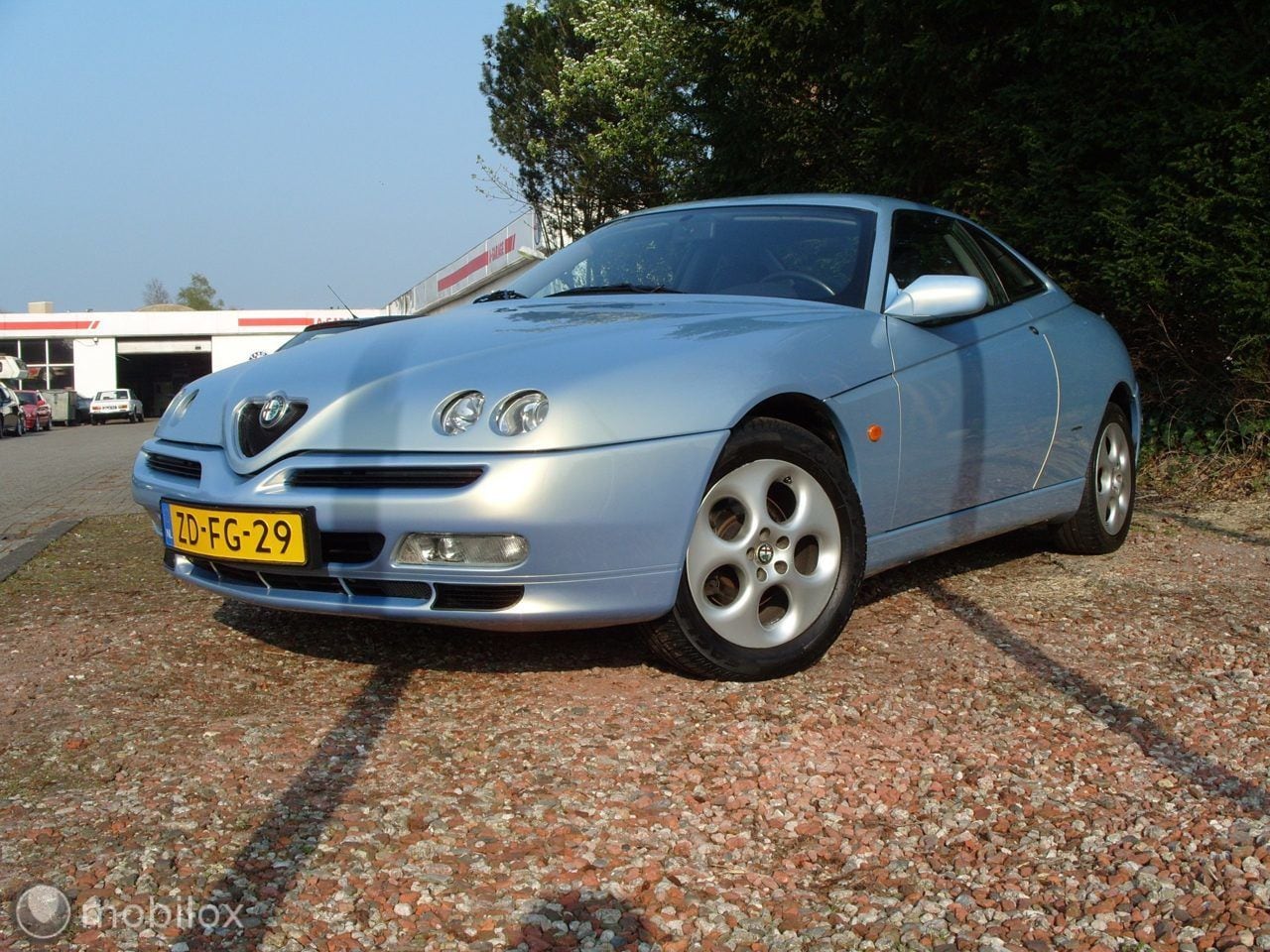 Alfa Romeo GTV - - 2.0 V6 TURBO AZZURRO NUVOLA 200 PK - AutoWereld.nl