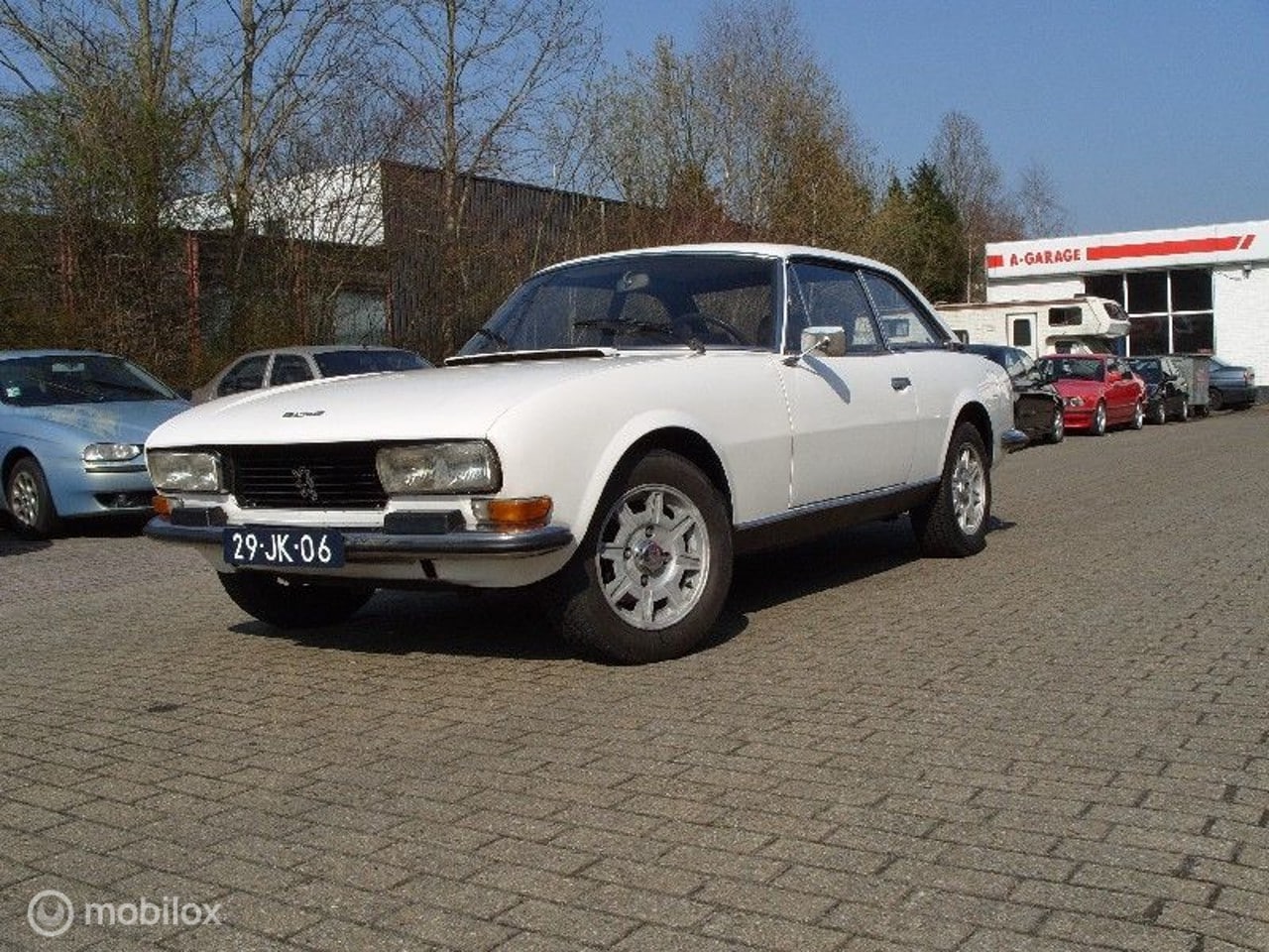 Peugeot 504 - - 2.7 V6 COUPÉ PININFARINA MET APK - AutoWereld.nl