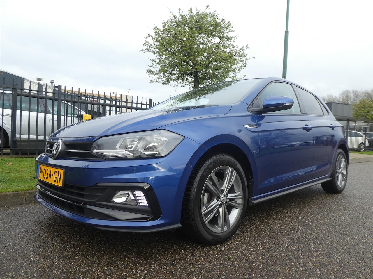 Volkswagen Polo - 1.0 TSI 95pk Highline Business R-Line Multi Media Navigatie - AutoWereld.nl