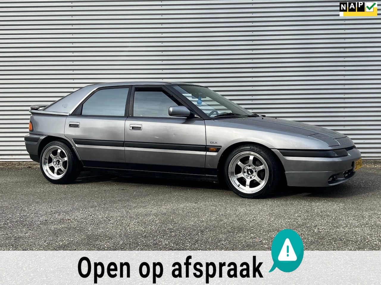 mazda-323-1-6i-f-glx-automaat-nap-nl-apk-2025.jpg