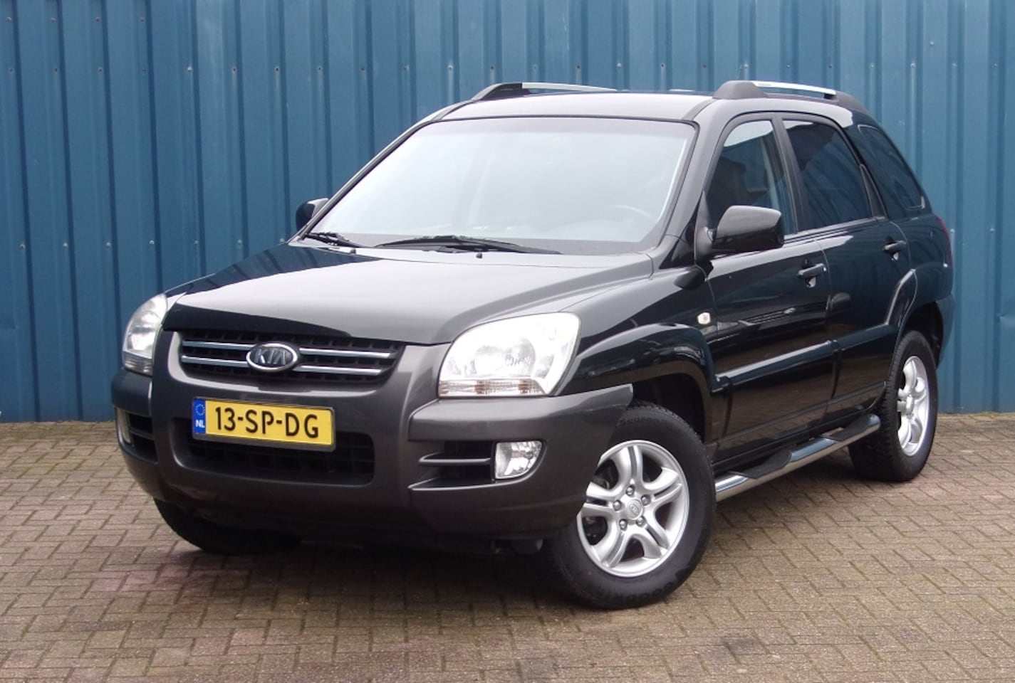 Kia Sportage - 2.0 CVVT Executive 2.0 CVVT Executive - AutoWereld.nl