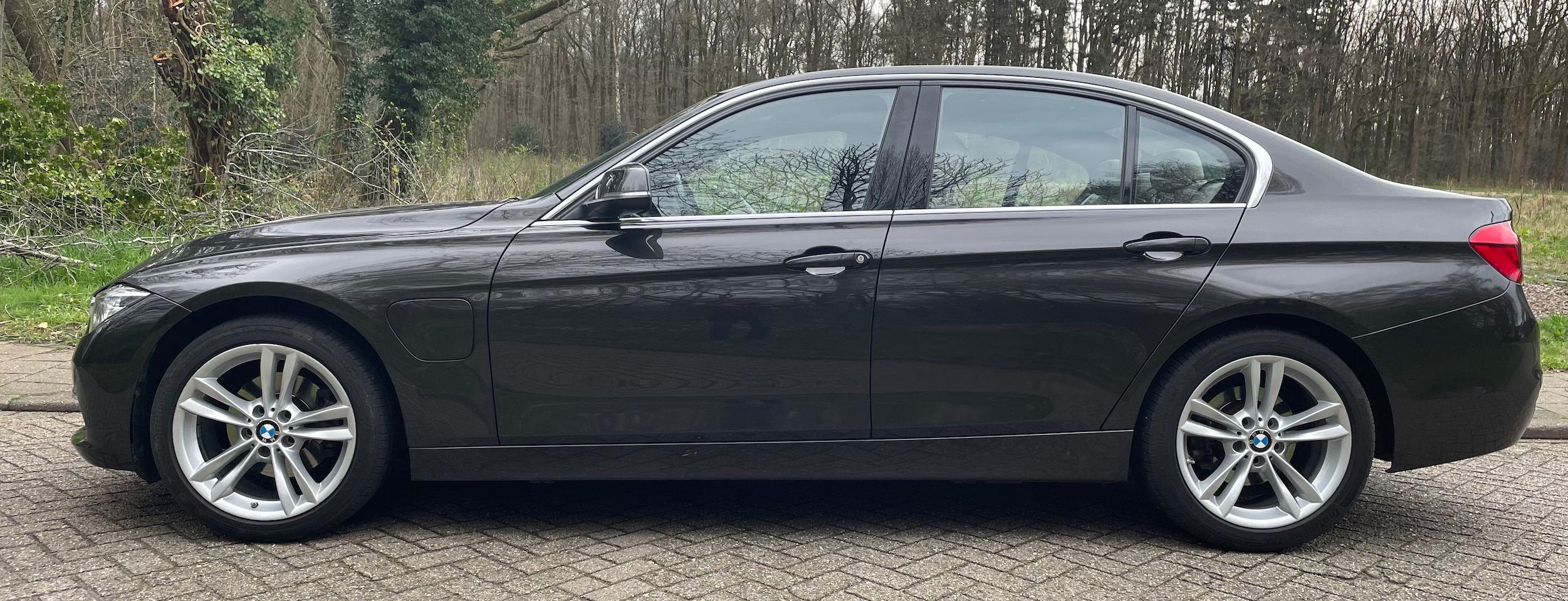 BMW 3-serie - 330e Luxury PHEV - AutoWereld.nl