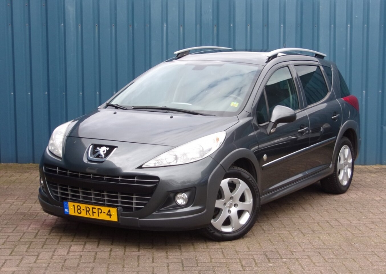 Peugeot 207 SW Outdoor - 1.6 VTi 1.6 VTi - AutoWereld.nl