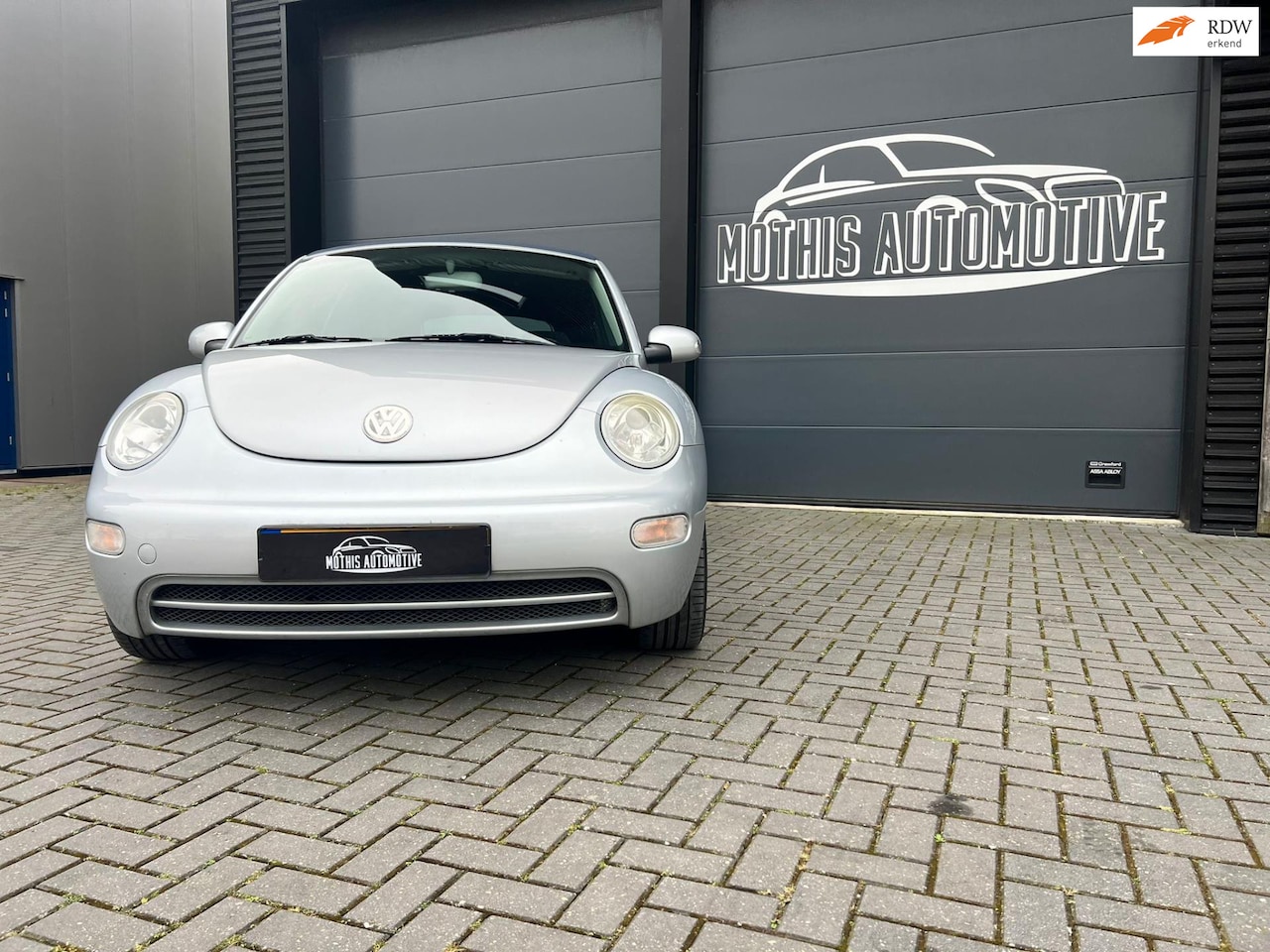 Volkswagen New Beetle Cabriolet - 2.0 - AutoWereld.nl