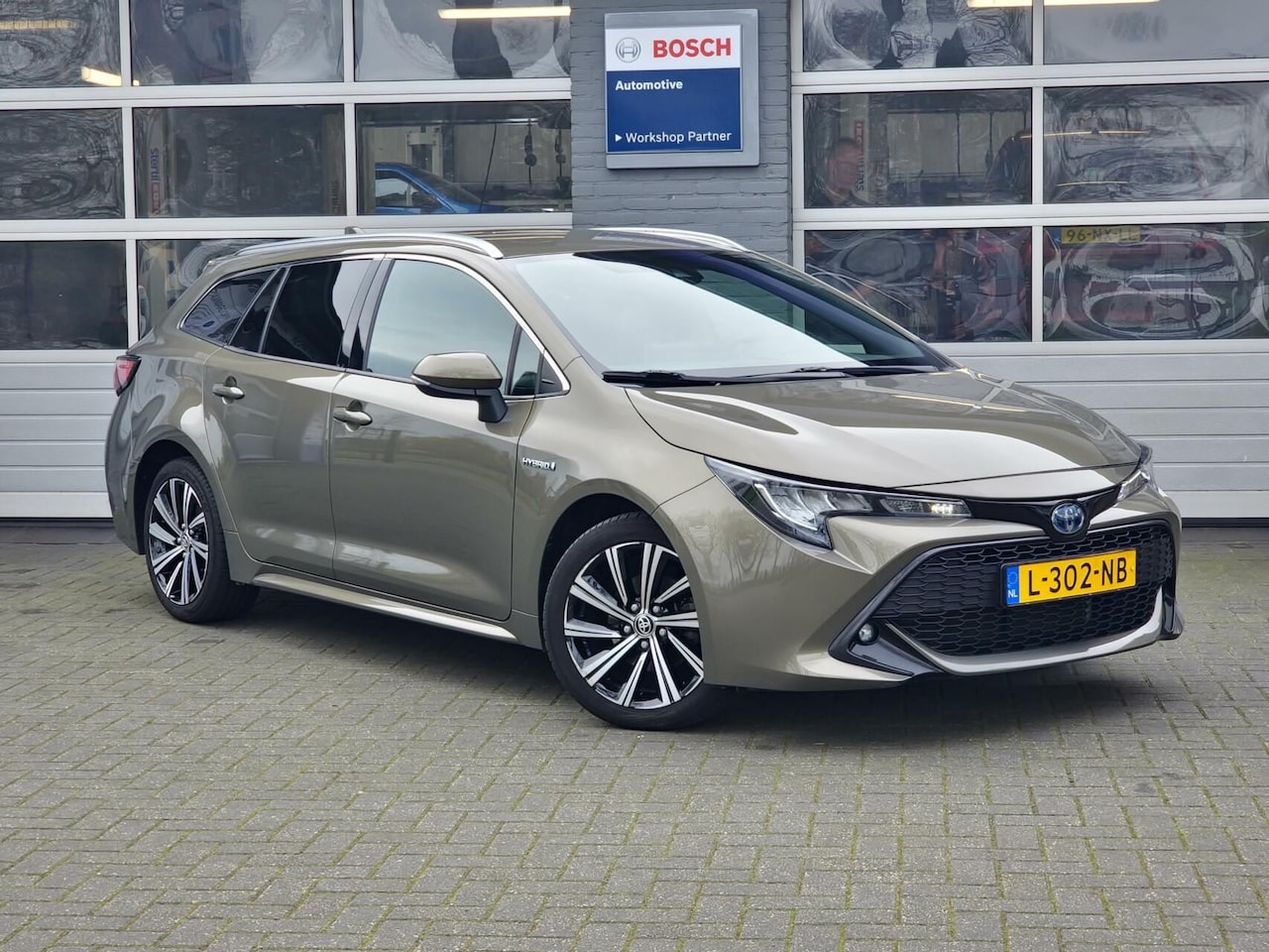 Toyota Corolla Touring Sports - Touring Sports 1.8 Hybrid Dynamic|Cruise|Clima|camera|Navi|Lane-assist| - AutoWereld.nl