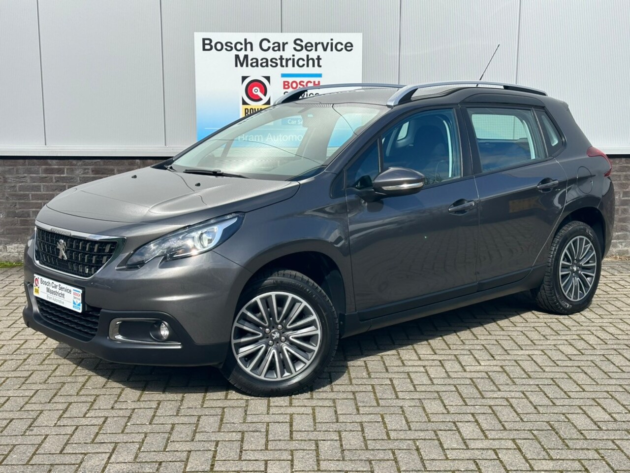 Peugeot 2008 - 1.2 PureTech Allure | Navigatie | Blue-tooth | PDC | Cruise Control | Garantie - AutoWereld.nl