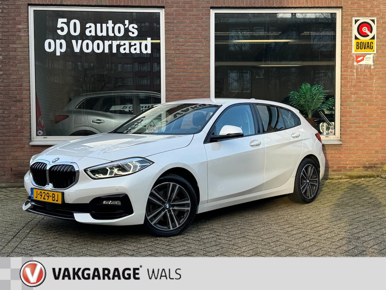 BMW 1-serie - 118i NAVI | CLIMA | CRUISE | VELGEN | SPORTSTOELEN | LED | BOVAG - AutoWereld.nl