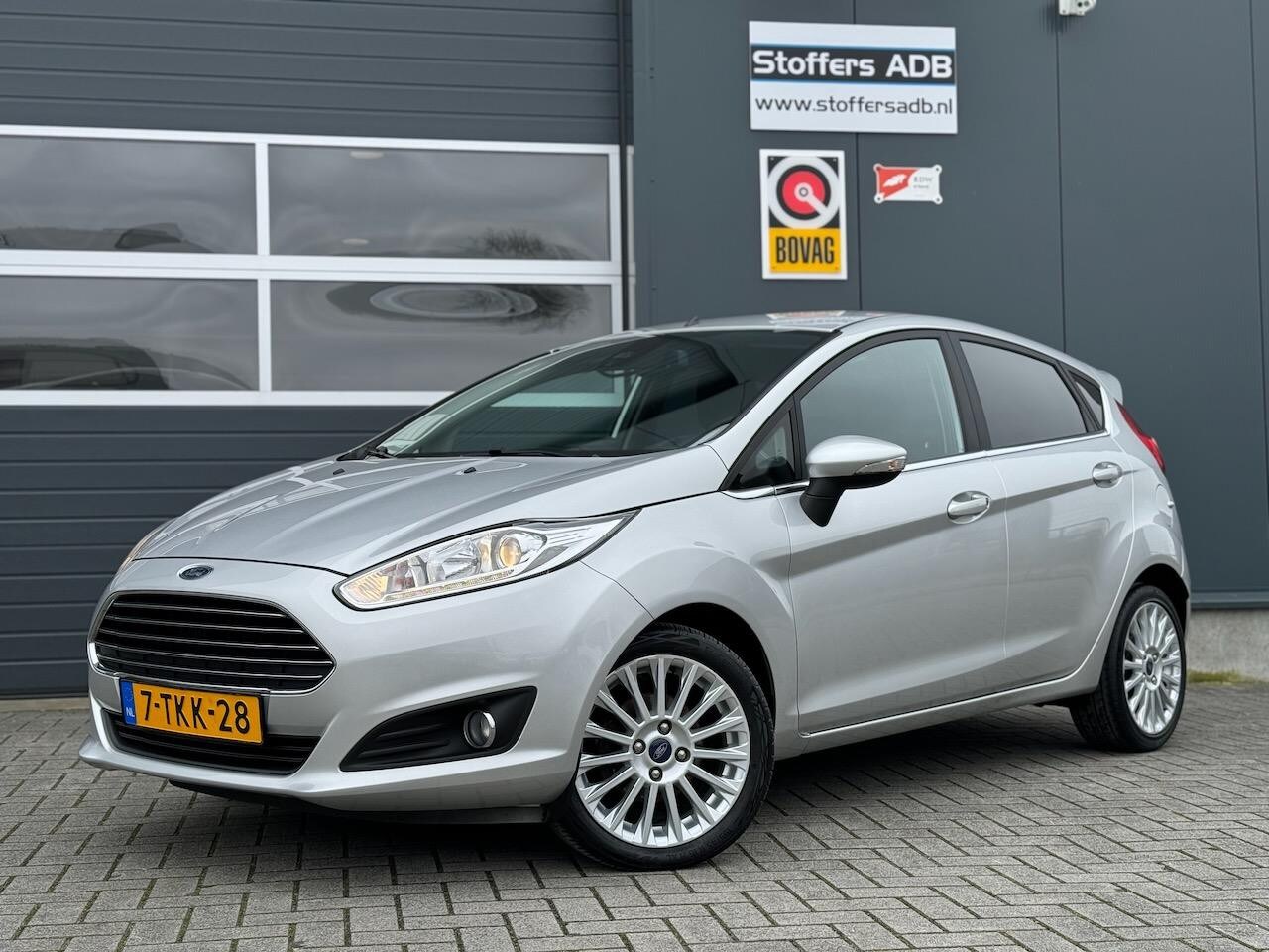 Ford Fiesta - 1.0 EB 101pk Titanium HANDBEDIENING / INVALIDE | Automaat | Navi | Cruise | Airco | Blueto - AutoWereld.nl