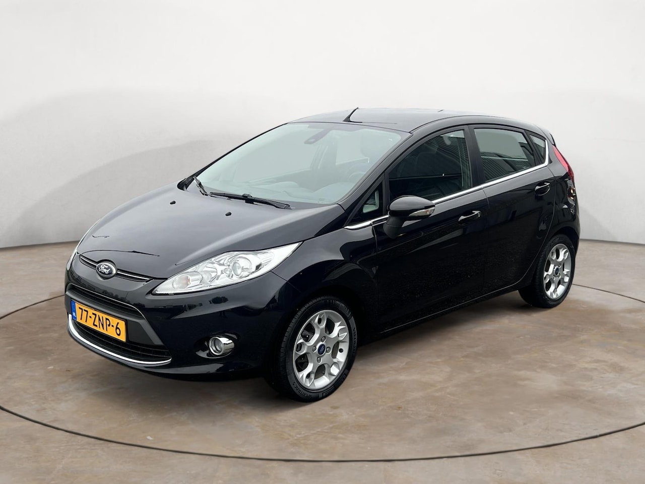 Ford Fiesta - 1.25 Titanium Handgeschakeld - Airco - 15''Lichtmetaal - Parkeerhulp achter - AutoWereld.nl