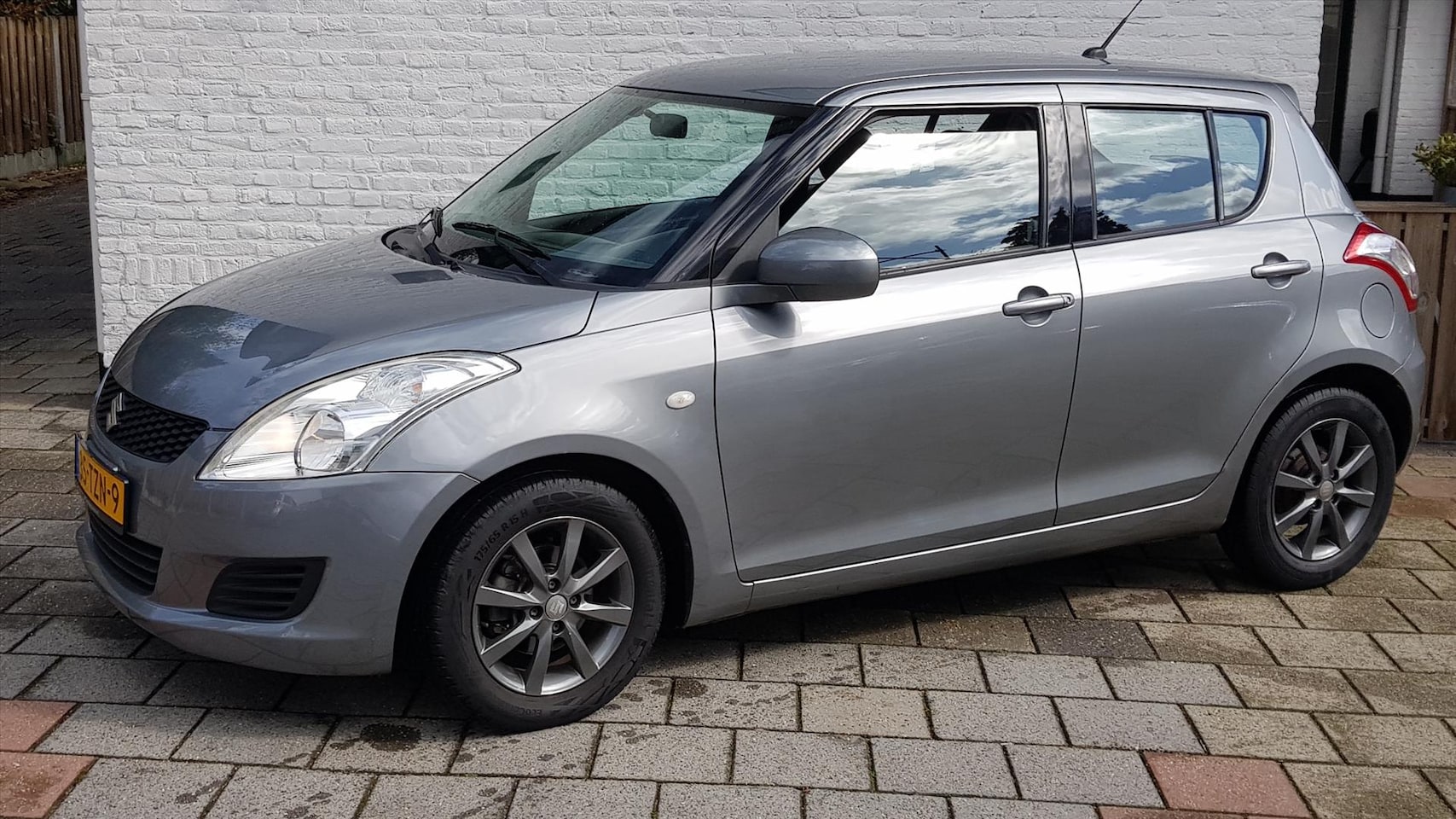 Suzuki Swift - 1.2 Comfort 1.2 5drs comfort, airco , cruise .lmv - AutoWereld.nl